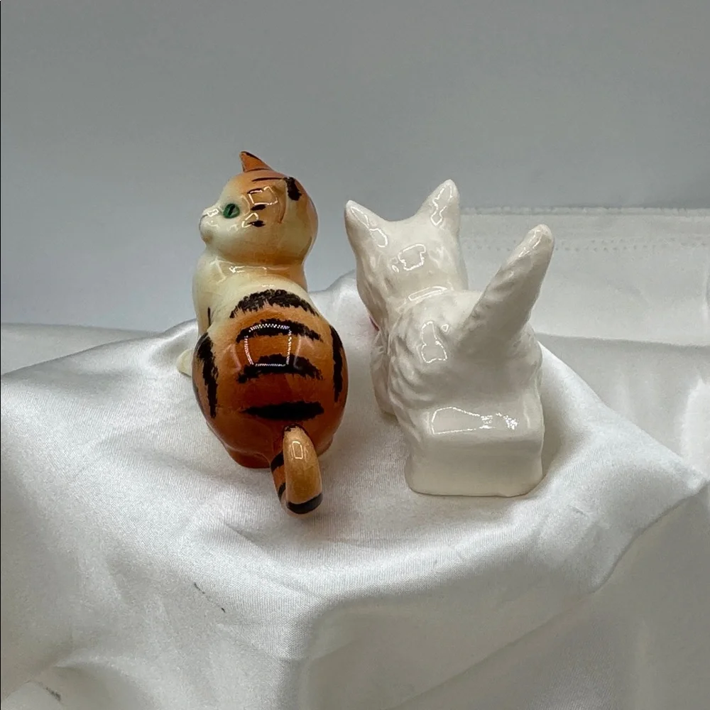 2 Goebel Cat Figurines, approximately 3” long each; and 2” tall
